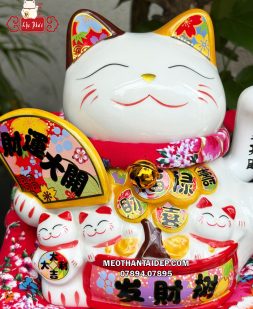 Mèo Thần Tài cây tiền quạt đại cát đại lợi