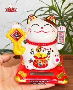 Mèo Thần Tài năng lượng mặt trời chữ phúc túi vàng