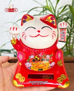 Mèo Thần Tài năng lượng đỏ cầm chuông vàng túi vàng