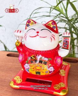 Mèo Thần Tài năng lượng đỏ cầm chuông vàng túi vàng