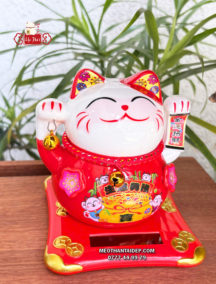 Mèo Thần Tài năng lượng đỏ cầm chuông vàng túi vàng